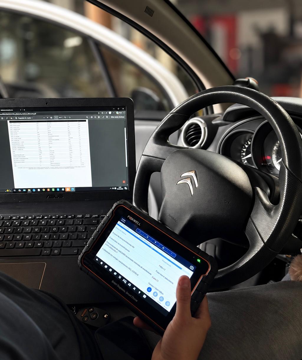 Diagnóstico automotivo com scanner e notebook em veículo Citroën, Angra dos Reis